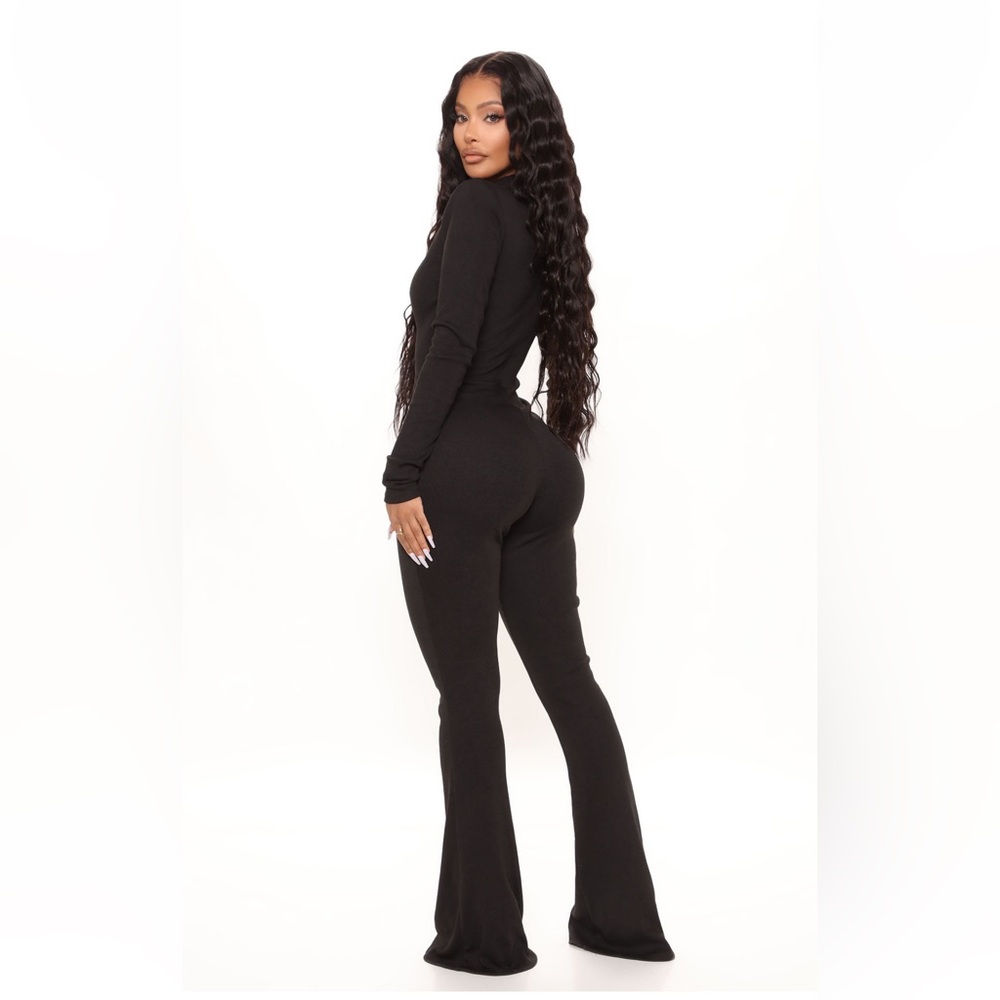 Black Fashion nova flare jumpsuit.
